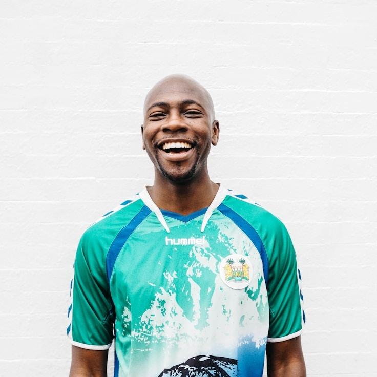 Kaveri Mehta, Lead Design Curator at BrownfieldStudio, reviewing corporate floral arrangements